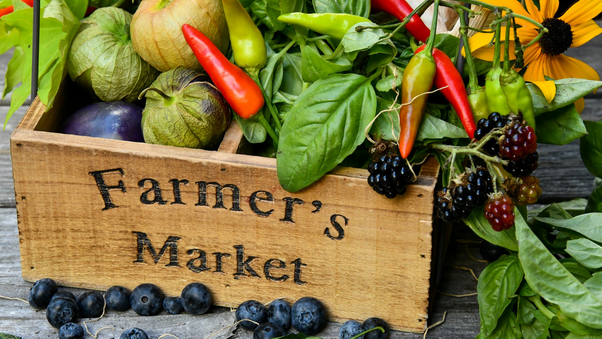Fresh produce in a wooden crate